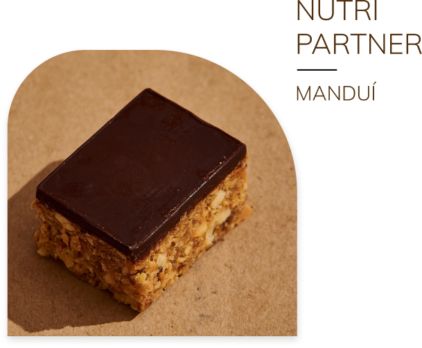 Barra de paçoca Manduí coberta com chocolate — selo Nutri Partner